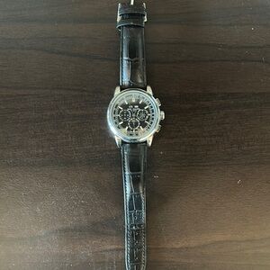 Patek Philippe Black and Silver Watch